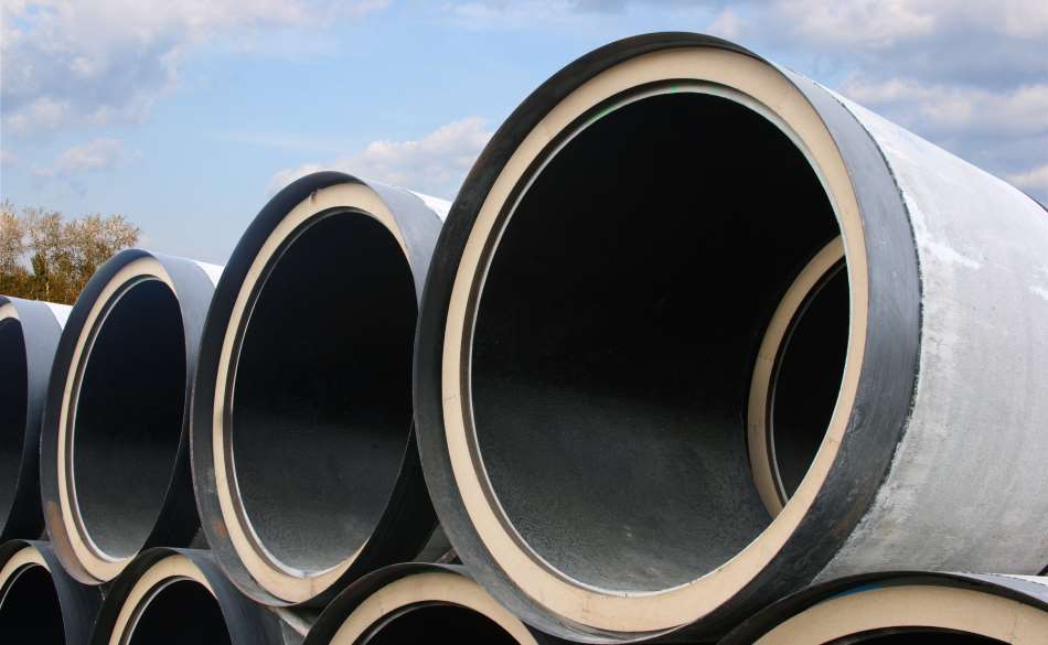 stack of large diameter pipes